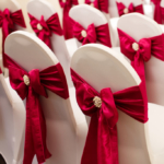 Close up of a dressed chair with a red ribbon prepared for a wedding at mercure hotels