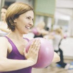 Women doing pilates at a fitness class