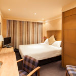 A classic double bedroom at Mercure Maidstone Great Danes Hotel