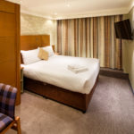 A classic double bedroom at Mercure Maidstone Great Danes Hotel