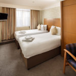 A classic twin bedroom at Mercure Maidstone Great Danes Hotel