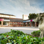 Exterior shot of Mercure Maidstone Great Danes Hotel, statue Great Danes