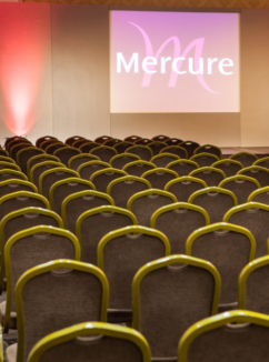 Chairs arranged for a presentation in the heart of kent suite at Mercure Maidstone Great Danes Hotel