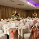 The Hollingbourne Suite at at Mercure Maidstone Great Danes Hotel set up for wedding breakfast