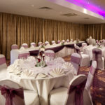 The Hollingbourne Suite at at Mercure Maidstone Great Danes Hotel set up for wedding breakfast