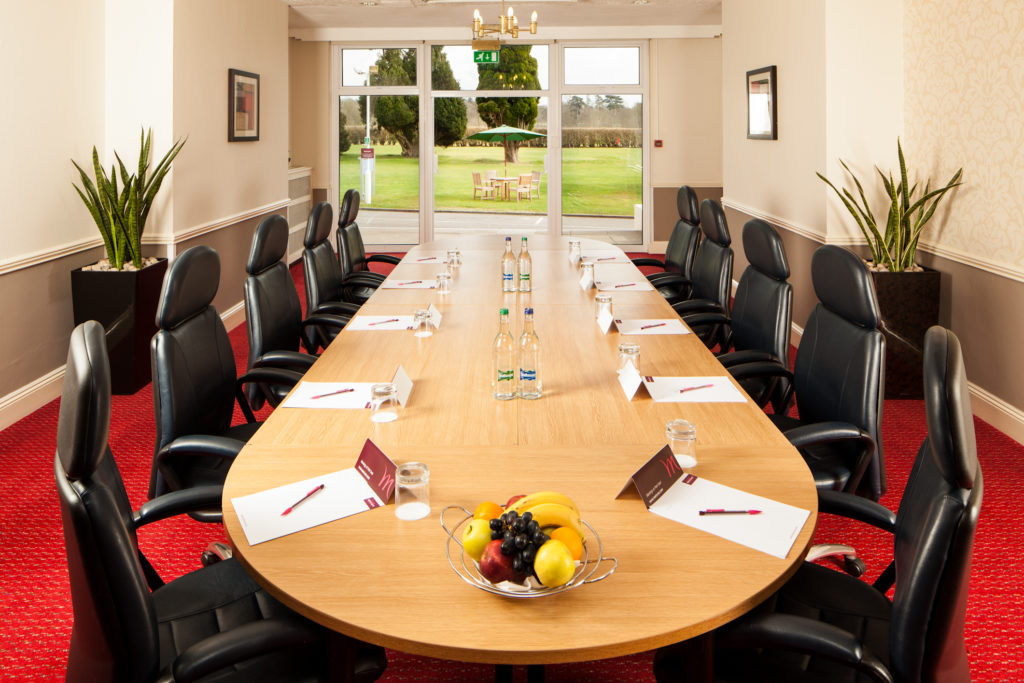 mercure-maidstone-great-danes-hotel-medway-room-meeting-01-lr-030412 Table set for a meeting in Medway room overlooking the gardens at Mercure Maidstone Great Danes Hotel