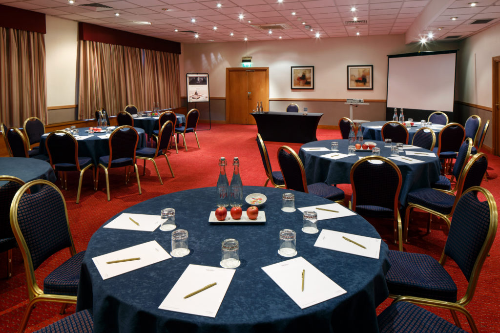 Tables set for a meeting in Park View at Mercure Maidstone Great Danes Hotel