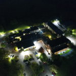 Birds eye view night time shot of Mercure Maidstone Great Danes Hotel and grounds