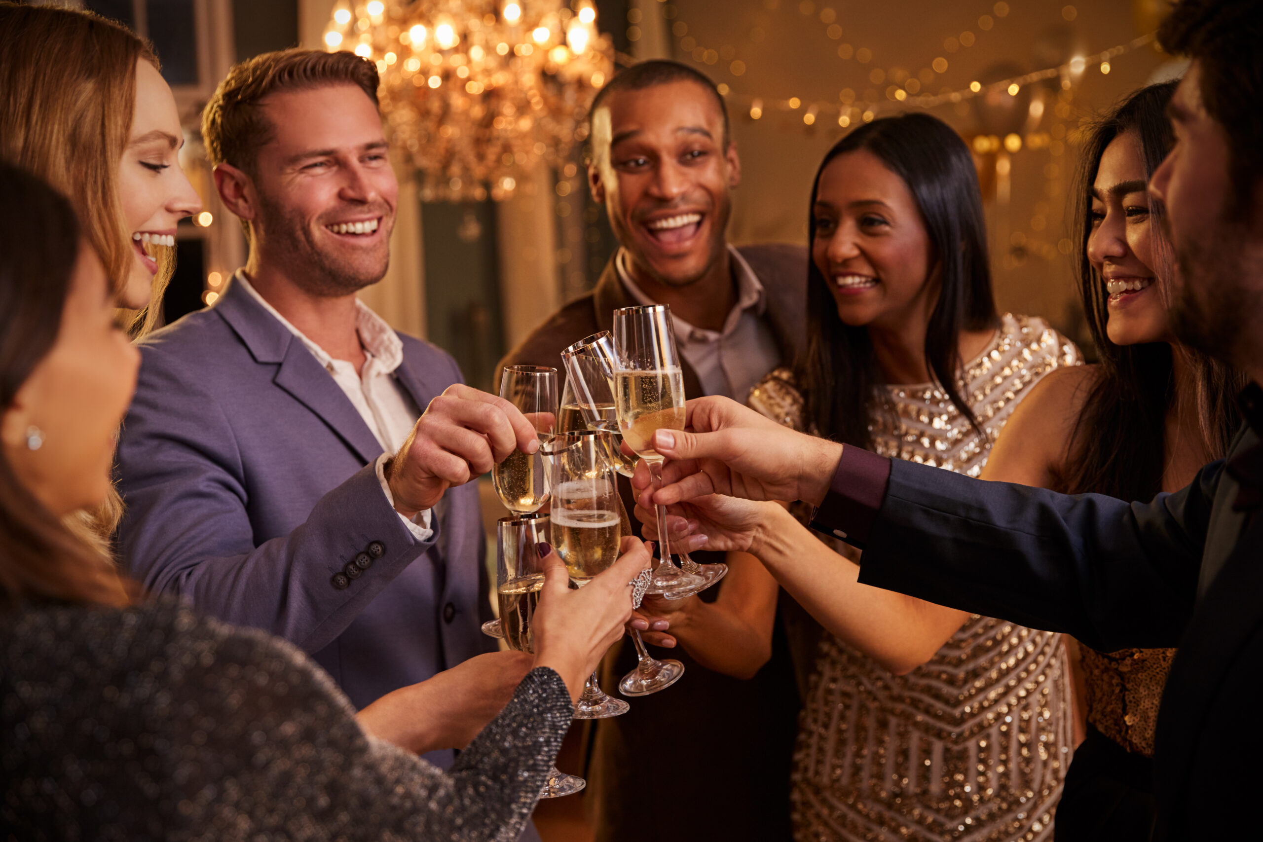 Friends,Make,Toast,As,They,Celebrate,At,Party,Together